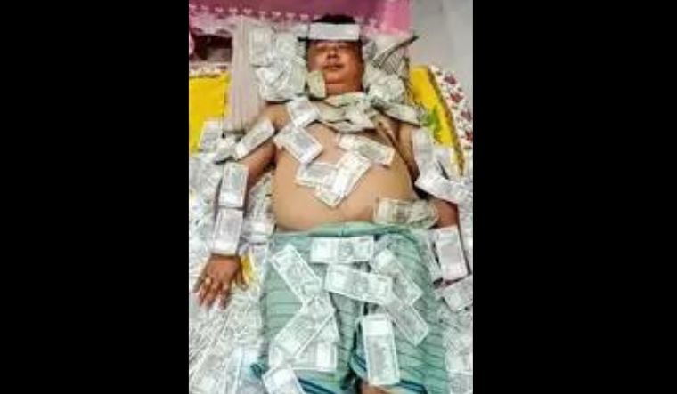 Who is Benjamin Basumatary? Truth about Assam politician sleeping on pile of Rs 500 notes - Vimarsana News